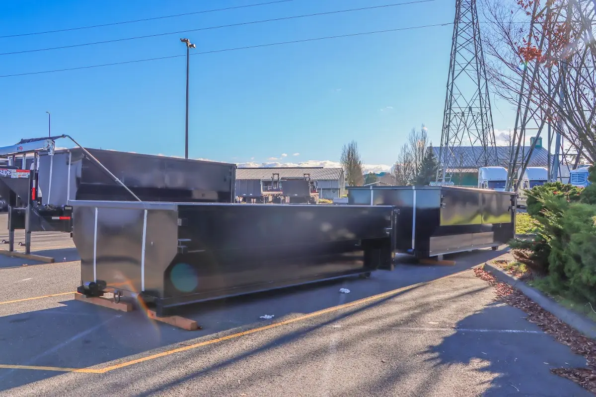 Roll-off dumpster ready for waste disposal at job site for 3 Yard Dumpster Rental in Fulshear